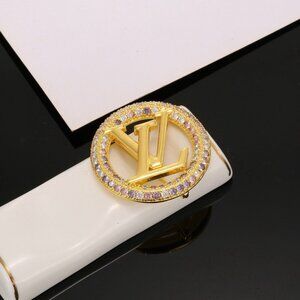 Louis Vuitton Gold and Purple Brooch Louis Vuitton Gold and Purple Brooch